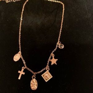 Gold cross necklace with star and crystal